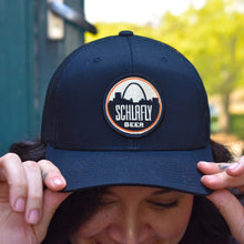 Load image into Gallery viewer, Schlafly Snapback Trucker Hat